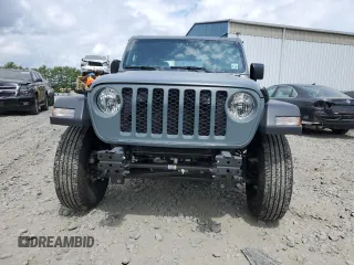 2024 Jeep Wrangler Sport S with VIN 1C4PJXAN5RW123740, listed as a Copart auction lot 62877324 with 5,758 mi miles and Salvage title. Bid and sale history available at DreamBid. Image 5.