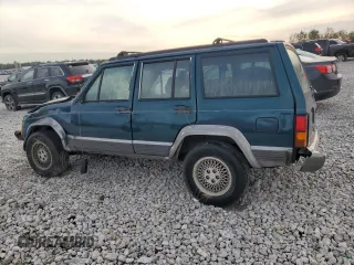1996 Jeep Cherokee Country with VIN 1J4FJ78S7TL242853, listed as a Copart auction lot 73022554 with 84,868 mi miles and Salvage Title. Bid and sale history available at carsss.com. Image 2.