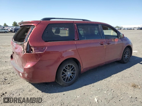2014 Toyota Sienna LE with VIN 5TDJK3DC5ES093932, listed as a Copart auction lot 63611985 with 142,044 mi miles and Salvage title. Bid and sale history available at DreamBid. Image 3.