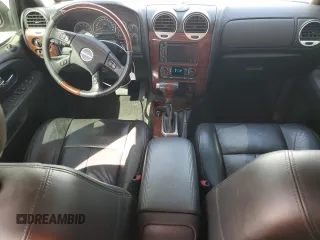 2006 GMC Envoy XL Denali with VIN 1GKES66MX66120332, listed as a Copart auction lot 49632955 with 100,580 mi miles and Salvage Title. Bid and sale history available at carsss.com. Image 8.