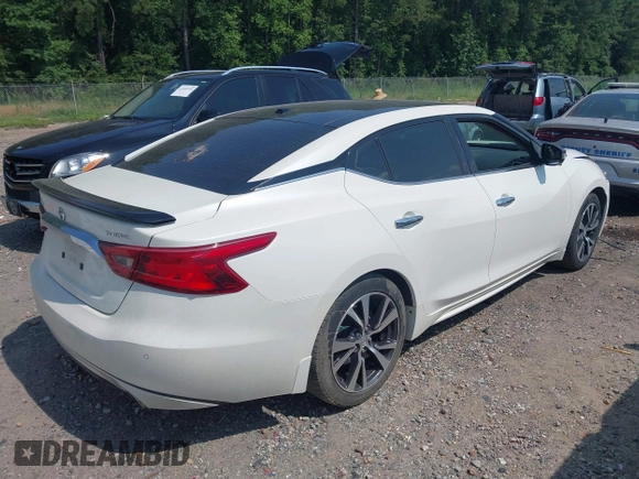 2017 Nissan Maxima S with VIN 1N4AA6APXHC371182, listed as a IAAI auction lot 42596000 with 159,710 mi miles and . Bid and sale history available at DreamBid. Image 4.