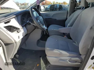 2019 Toyota Sienna L with VIN 5TDZZ3DC6KS995130, listed as a Copart auction lot 77712554 with 71,057 mi miles and Salvage Title. Bid and sale history available at carsss.com. Image 7.