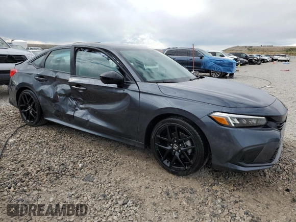 2024 Honda Civic Sport with VIN 2HGFE2F53RH592613, listed as a Copart auction lot 56556885 with 10,849 mi miles and Salvage title. Bid and sale history available at DreamBid. Image 4.