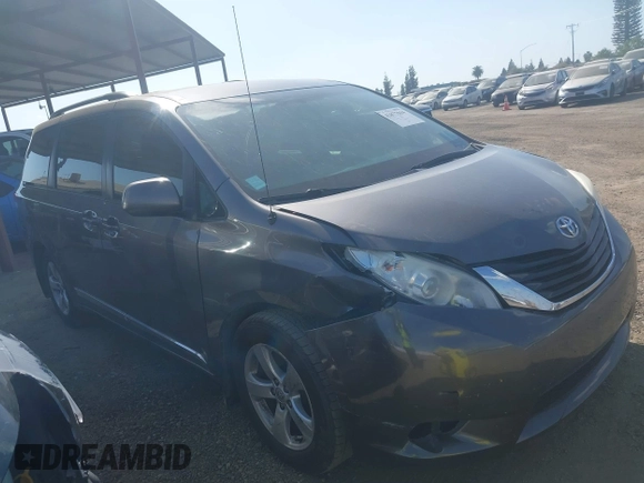 2014 Toyota Sienna LE AAS with VIN 5TDKK3DC0ES498732, listed as a IAAI auction lot 42077044 with 189,745 mi miles and . Bid and sale history available at carsss.com. Image 1.
