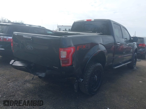 2015 Ford F-150 XLT w/HD Payload Pkg with VIN 1FTFW1EF9FFA14450, listed as a IAAI auction lot 41867454 with 146,157 mi miles. Bid and sale history available at carsss.com. Image 6.