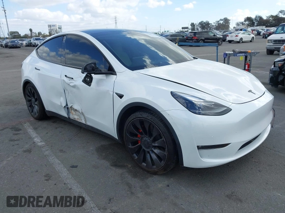 2022 Tesla Model Y Performance with VIN 7SAYGDEF1NF559572, listed as a IAAI auction lot 41516070 with 43,240 mi miles and . Bid and sale history available at DreamBid. Image 1.