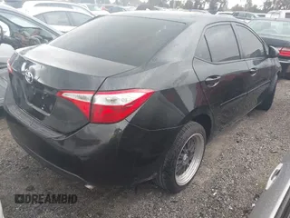 2016 Toyota Corolla L with VIN 5YFBURHE9GP367724, listed as a IAAI auction lot 41604538 with 101,968 mi miles and . Bid and sale history available at DreamBid. Image 4.