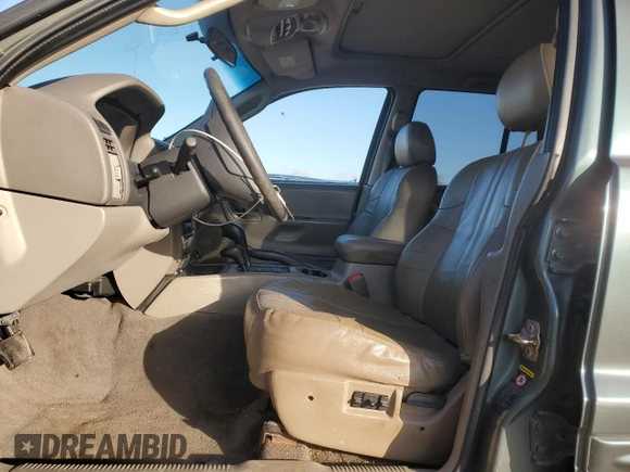 2004 Jeep Grand Cherokee with VIN 1J8GW48N24C304268, listed as a Copart auction lot 45559065 with 252,903 mi miles and Salvage title. Bid and sale history available at DreamBid. Image 7.