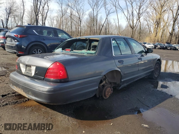 2004 Ford Police Interceptor Base w/3.27 Axle with VIN 2FAFP71W54X126756, listed as a Copart auction lot 50311705 with 135,654 mi miles and Salvage title. Bid and sale history available at DreamBid. Image 3.