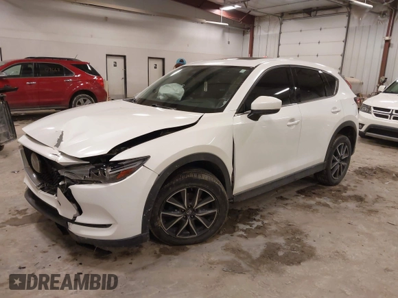 2018 Mazda CX-5 S Premium with VIN JM3KFBDM1J1412088, listed as a IAAI auction lot 41497431 with 65,532 mi miles and . Bid and sale history available at DreamBid. Image 17.