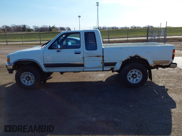 1994 Toyota Pickup SR5 z VIN JT4VN13G3R5138301, wystawiony jako IAAI lot #41871065 z przebiegiem 181 040 mil mil oraz . Historia ofert i sprzedaży dostępna na DreamBid. Obrazek 12.