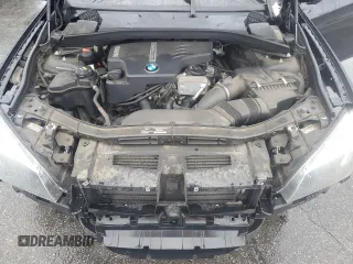 2015 BMW X1 sDrive28i with VIN WBAVM1C55FVW56937, listed as a Copart auction lot 45050785 with 77,736 mi miles and Salvage Title. Bid and sale history available at carsss.com. Image 12.