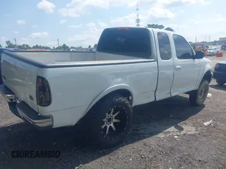 2001 Ford F-150 XL with VIN 1FTRX18L71NB11026, listed as a IAAI auction lot 42590063 with 218,156 mi miles and . Bid and sale history available at DreamBid. Image 4.