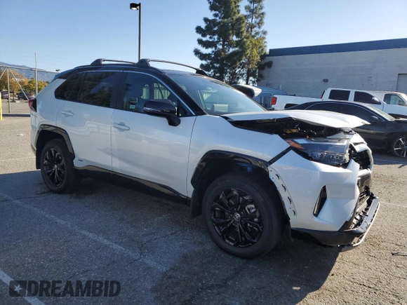 2024 Toyota RAV4 Hybrid XSE with VIN 2T3E6RFV4RW060903, listed as a Copart auction lot 49515785 with 8,637 mi miles and Salvage Title. Bid and sale history available at DreamBid. Image 4.