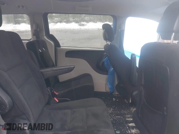 2016 Dodge Grand Caravan SE with VIN 2C4RDGBG3GR258639, listed as a IAAI auction lot 41687082 with 99,616 mi miles and . Bid and sale history available at DreamBid. Image 8.