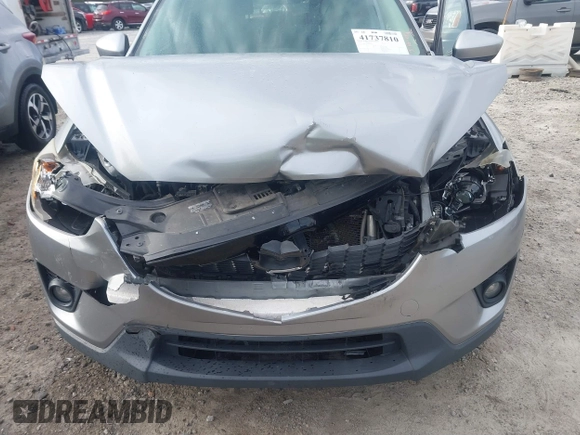 2015 Mazda CX-5 Touring with VIN JM3KE2CYXF0435583, listed as a IAAI auction lot 41737810 with 107,270 mi miles and . Bid and sale history available at DreamBid. Image 6.