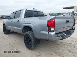 2021 Toyota Tacoma SR with VIN 5TFAX5GN7MX192500, listed as a IAAI auction lot 41674939 with 33,608 mi miles and . Bid and sale history available at DreamBid. Image 3.