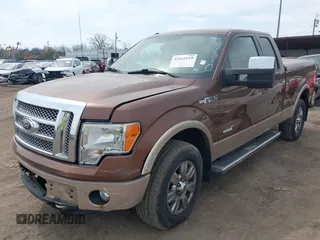 2011 Ford F-150 XL with VIN 1FTFX1ET9BKD67310, listed as a IAAI auction lot 42016119 with 147,114 mi miles. Bid and sale history available at carsss.com. Image 2.
