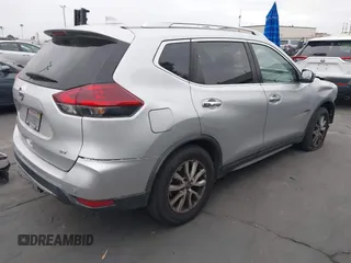 2019 Nissan Rogue SV with VIN KNMAT2MT3KP531635, listed as a IAAI auction lot 42043818 with 147,068 mi miles and . Bid and sale history available at DreamBid. Image 4.