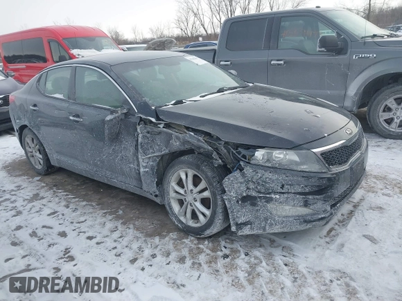 2013 Kia Optima EX with VIN 5XXGN4A72DG143975, listed as a IAAI auction lot 41385803 with 216,203 mi miles. Bid and sale history available at carsss.com. Image 1.
