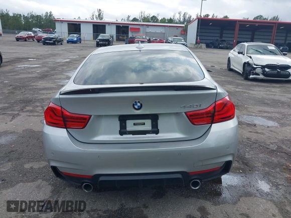 2018 BMW 4 Series 440i with VIN WBA4J5C57JBF07227, listed as a IAAI auction lot 41562986 with 76,316 mi miles and . Bid and sale history available at DreamBid. Image 16.