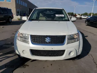 2012 Suzuki Grand Vitara Premium z VIN JS3TD0D64C4100245, wystawiony jako Copart lot #71365134 z przebiegiem 100 501 mil mil oraz Szkoda całkowita • Salvage title. Historia ofert i sprzedaży dostępna na DreamBid. Obrazek 5.