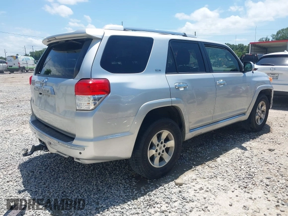 2013 Toyota 4Runner SR5 with VIN JTEZU5JR4D5050331, listed as a IAAI auction lot 42340443 with 220,799 mi miles and . Bid and sale history available at DreamBid. Image 4.