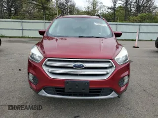 2018 Ford Escape SE z VIN 1FMCU9GD7JUB01668, wystawiony jako Copart lot #57038675 z przebiegiem 70 780 mil mil oraz Szkoda całkowita • Salvage title. Historia ofert i sprzedaży dostępna na DreamBid. Obrazek 5.