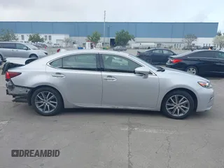 2016 Lexus ES 300h with VIN JTHBW1GG6G2118339, listed as a IAAI auction lot 41910352 with 73,184 mi miles and . Bid and sale history available at DreamBid. Image 14.