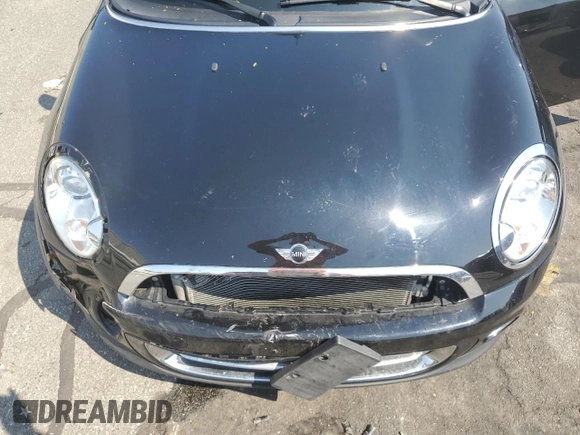 2013 MINI Convertible z VIN WMWZN3C54DT568237, wystawiony jako Copart lot #72354594 z przebiegiem 141 058 mil mil oraz Szkoda całkowita • Salvage title. Historia ofert i sprzedaży dostępna na DreamBid. Obrazek 11.