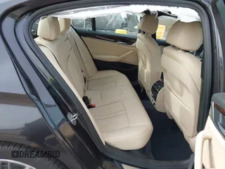 2019 BMW 5 Series 530i xDrive with VIN WBAJA7C5XKWW31983, listed as a IAAI auction lot 41893477 with 127,535 mi miles and . Bid and sale history available at carsss.com. Image 8.