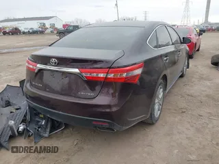 2013 Toyota Avalon XLE with VIN 4T1BK1EB2DU076865, listed as a IAAI auction lot 41722389 with 183,617 mi miles and . Bid and sale history available at DreamBid. Image 4.