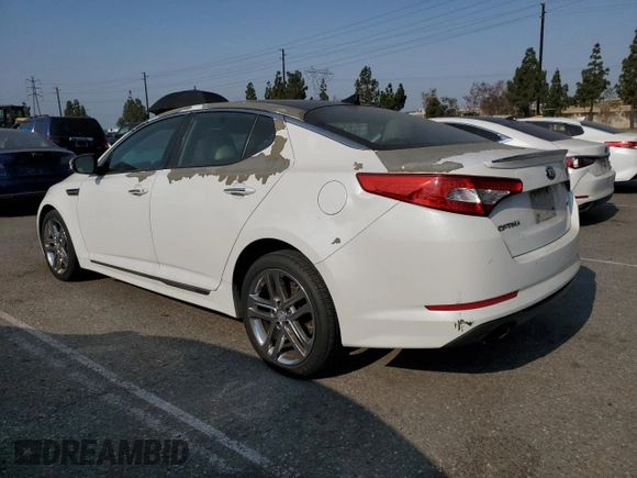 2013 Kia Optima SX with VIN 5XXGR4A69DG090574, listed as a Copart auction lot 64292965 with 236,765 mi miles and Clean title. Bid and sale history available at DreamBid. Image 2.