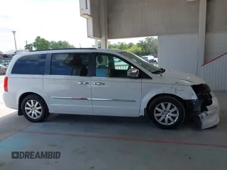 2016 Chrysler Town & Country Touring with VIN 2C4RC1BG5GR149731, listed as a IAAI auction lot 42127879 with 224,631 mi miles. Bid and sale history available at carsss.com. Image 14.
