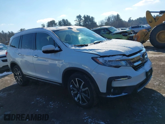 2020 Honda Pilot Elite with VIN 5FNYF6H09LB039247, listed as a IAAI auction lot 41364383 with 56,865 mi miles and . Bid and sale history available at DreamBid. Image 12.