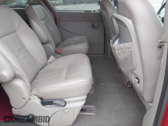 2003 Dodge Grand Caravan with VIN 2D8GP74L83R103749, listed as a IAAI auction lot 41880487 with 270,244 mi miles and . Bid and sale history available at DreamBid. Image 8.