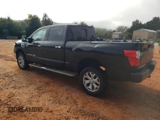 2016 Nissan Titan XD PRO-4X with VIN 1N6BA1F45GN506648, listed as a Copart auction lot 74381534 with 154,114 mi miles and Salvage Title. Bid and sale history available at carsss.com. Image 2.