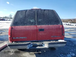 1997 GMC Suburban z VIN 3GKGK26J9VG515459, wystawiony jako Copart lot #87515385 z przebiegiem 205 982 mil mil oraz Szkoda całkowita • Salvage title. Historia ofert i sprzedaży dostępna na DreamBid. Obrazek 6.