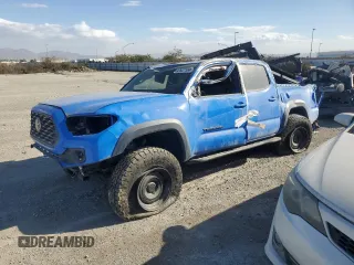 2020 Toyota Tacoma SR5 z VIN 3TMCZ5AN6LM310164, wystawiony jako Copart lot #47098995 z przebiegiem 18 285 mil mil oraz Szkoda całkowita • Salvage title. Historia ofert i sprzedaży dostępna na DreamBid. Obrazek 1.