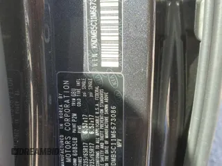 2021 Kia Sedona EX with VIN KNDMB5C11M6673086, listed as a Copart auction lot 42244935 with 57,698 mi miles and Salvage Title. Bid and sale history available at carsss.com. Image 13.