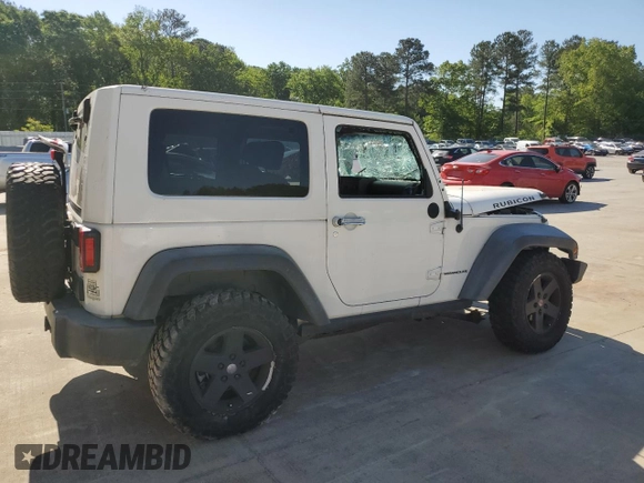 2008 Jeep Wrangler Rubicon с VIN 1J4GA641X8L561909, выставлен на аукционе Copart как лот 53275795 с пробегом 140 479 миль миль и Списание • Salvage title. История ставок и продаж доступна на DreamBid. Изображение 3.