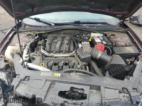 2012 Ford Fusion SEL with VIN 3FAHP0JG1CR358874, listed as a Copart auction lot 86041954 with 59,964 mi miles and Salvage Title. Bid and sale history available at DreamBid. Image 11.