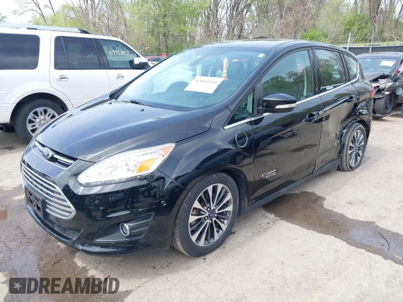 2017 Ford C-Max Energi Titanium with VIN 1FADP5FU2HL115199, listed as a IAAI auction lot 42001944 with 57,609 mi miles. Bid and sale history available at carsss.com. Image 17.