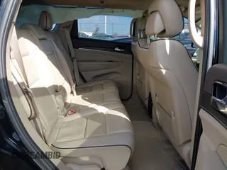 2019 Jeep Grand Cherokee Overland with VIN 1C4RJFCGXKC688543, listed as a IAAI auction lot 41643678 with 65,182 mi miles. Bid and sale history available at carsss.com. Image 8.