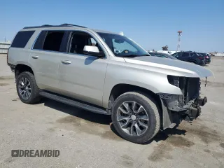 2016 Chevrolet Tahoe LS with VIN 1GNSCAKC7GR465949, listed as a Copart auction lot 50030625 with 136,608 mi miles and Salvage title. Bid and sale history available at DreamBid. Image 4.
