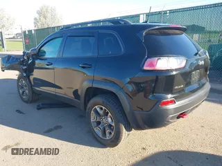 2019 Jeep Cherokee Trailhawk z VIN 1C4PJMBX0KD210316, wystawiony jako IAAI lot #42155261 z przebiegiem 100 889 mil mil oraz . Historia ofert i sprzedaży dostępna na DreamBid. Obrazek 3.