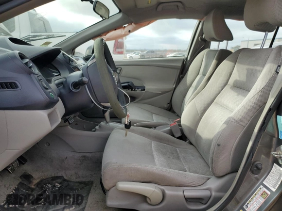 2010 Honda Insight LX with VIN JHMZE2H57AS004555, listed as a Copart auction lot 46925675 with 178,707 mi miles and Salvage Title. Bid and sale history available at DreamBid. Image 7.