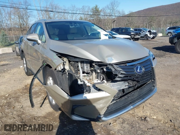 2016 Lexus RX 450h z VIN 2T2BGMCA7GC007006, wystawiony jako IAAI lot #41999343 z przebiegiem 124 912 mil mil oraz . Historia ofert i sprzedaży dostępna na DreamBid. Obrazek 6.