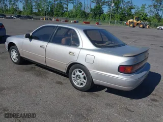 1994 Toyota Camry XLE with VIN 4T1GK13E1RU045195, listed as a IAAI auction lot 41715494 with 177,236 mi miles. Bid and sale history available at carsss.com. Image 3.
