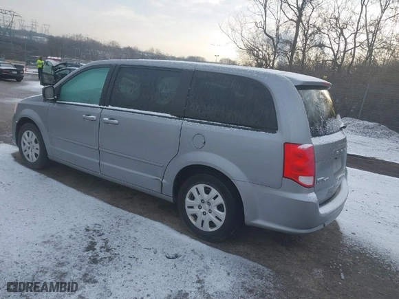 2014 Dodge Grand Caravan SE with VIN 2C4RDGBG1ER292057, listed as a IAAI auction lot 41487318 with 161,202 mi miles. Bid and sale history available at carsss.com. Image 3.